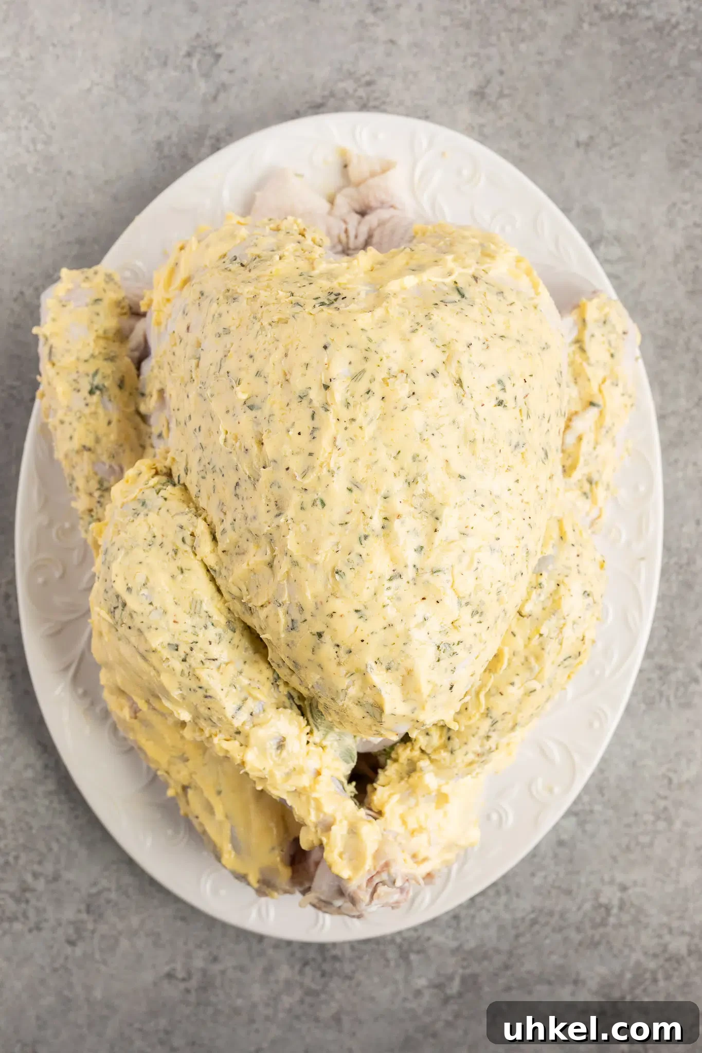 turkey rubbed with seasoned herb butter