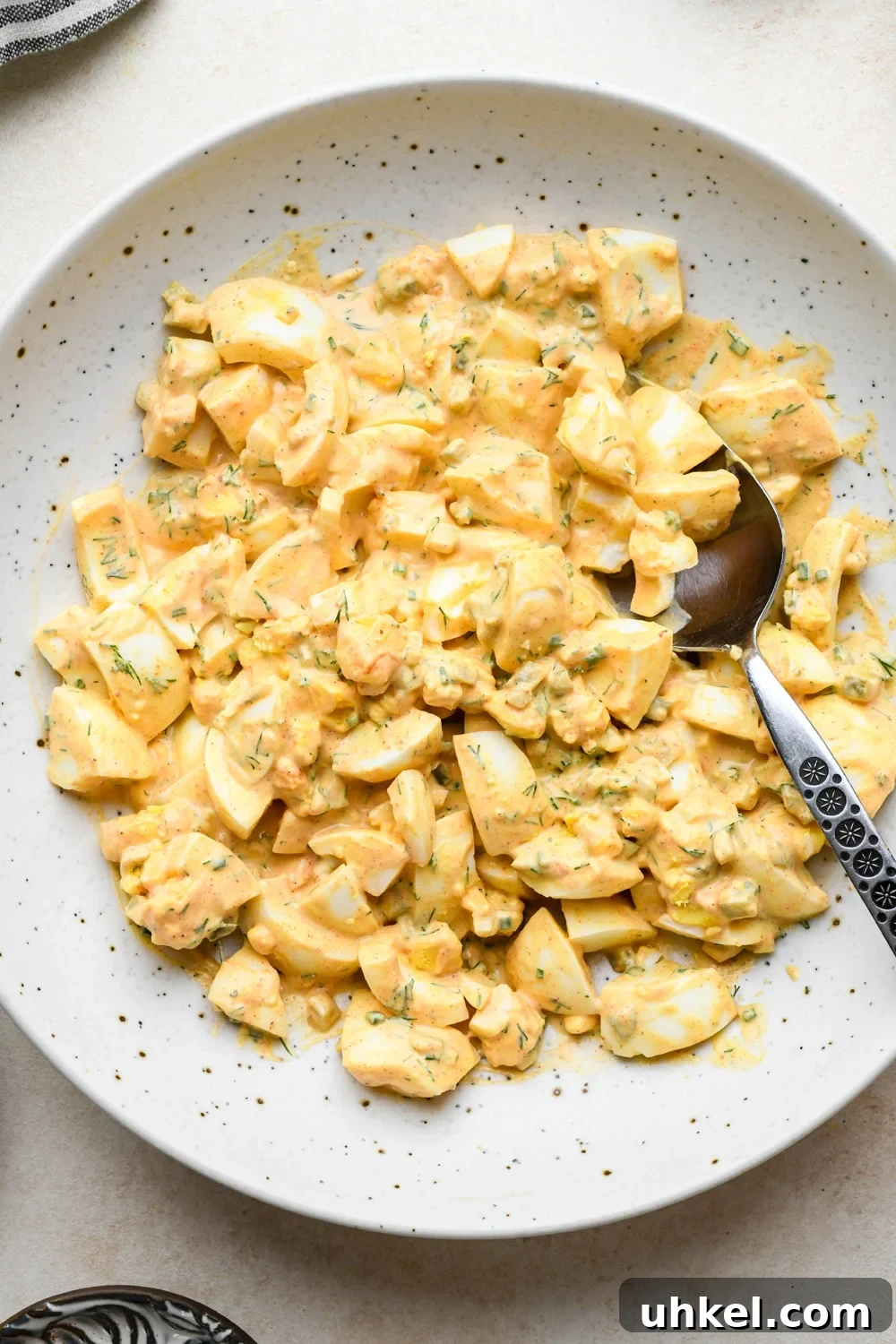 Creamy Deviled Egg Salad Recipe — Ready in 30 Minutes 11 How to make deviled egg salad: Egg salad mixed together in a medium sized bowl.
