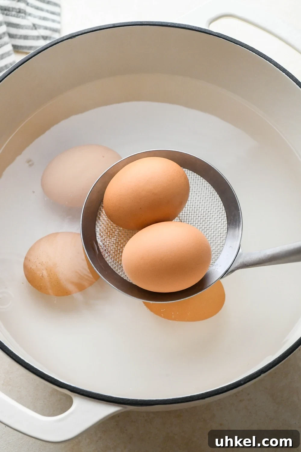 Creamy Deviled Egg Salad Recipe — Ready in 30 Minutes 6 How to make deviled egg salad: Lowering eggs into simmering water in a medium sized pot.
