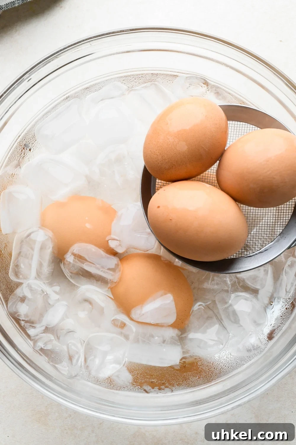 Creamy Deviled Egg Salad Recipe — Ready in 30 Minutes 7 How to make deviled egg salad: Lowering hard boiled eggs into an ice water bath.