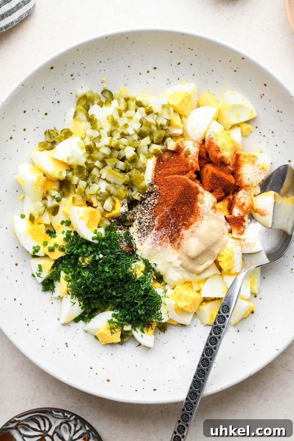 Creamy Deviled Egg Salad Recipe — Ready in 30 Minutes 9 How to make deviled egg salad: Chopped hard boiled eggs in a medium sized bowl with remaining egg salad ingredients.