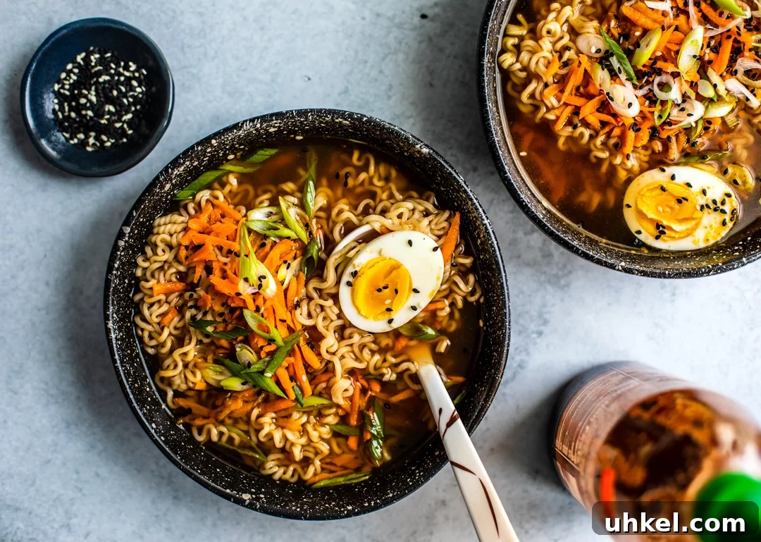 Homemade Ramen Bowl Recipe: Savory Broth & Tasty Toppings 4 Ramen soup in a bowl with a soft-boiled egg on top.
