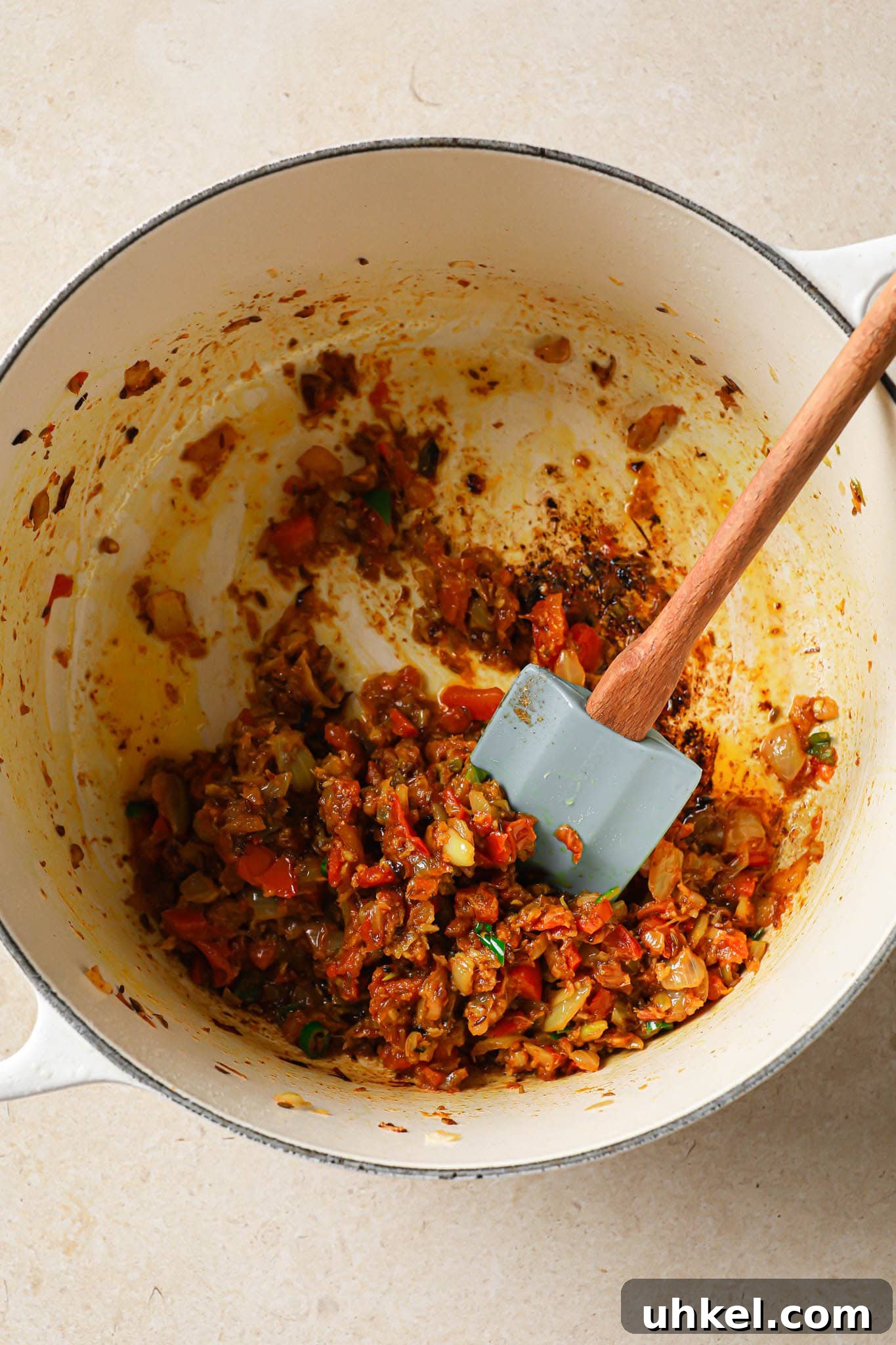 Authentic Masoor Dal (Red Lentil) Recipe for Perfect Flavor 12 Adding tomatoes to browned onions.