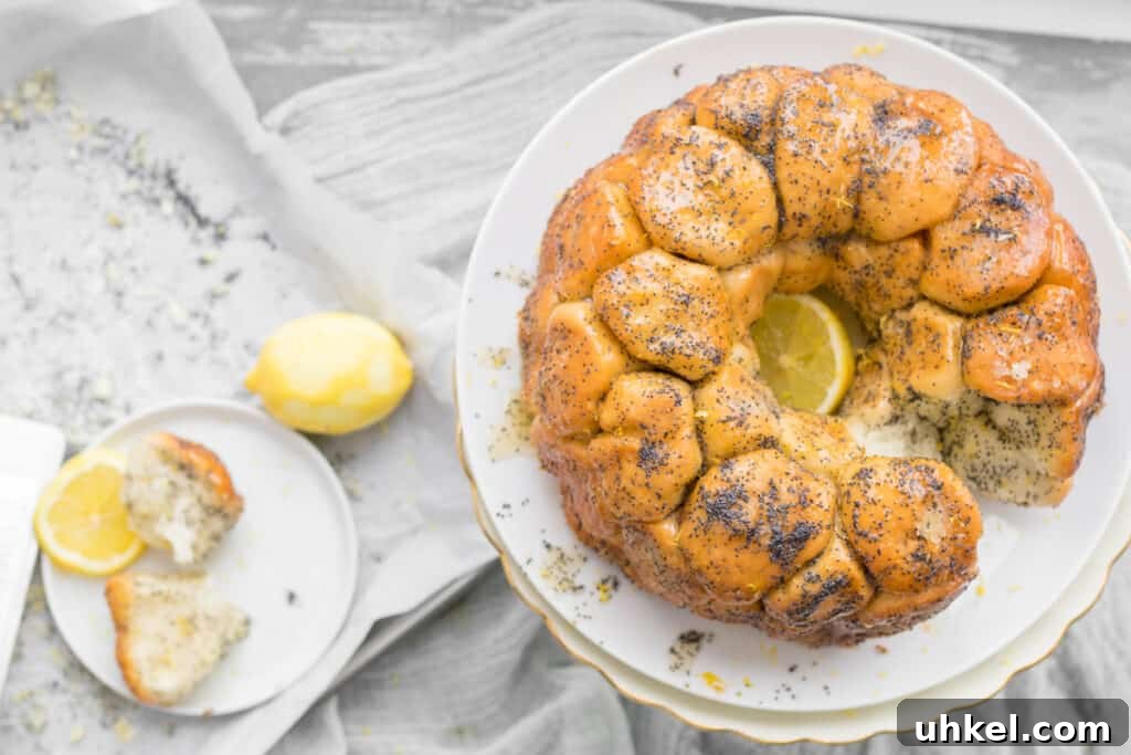Lemon Poppy Seed Monkey Bread Recipe — Light Citrus Pull‑Apart Bread 2 lemon poppyseed monkey bread on a cake stand
