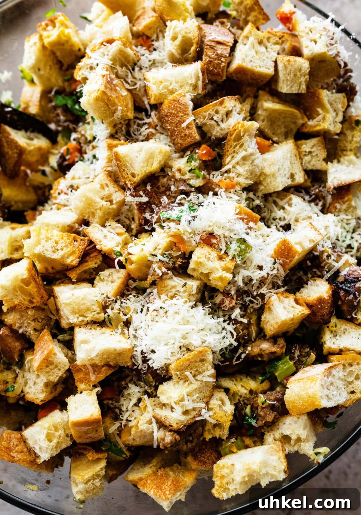 Sausage and Chestnut Ciabatta Stuffing Recipe for Holiday Tables 11 Tossing all ingredients in the bowl.