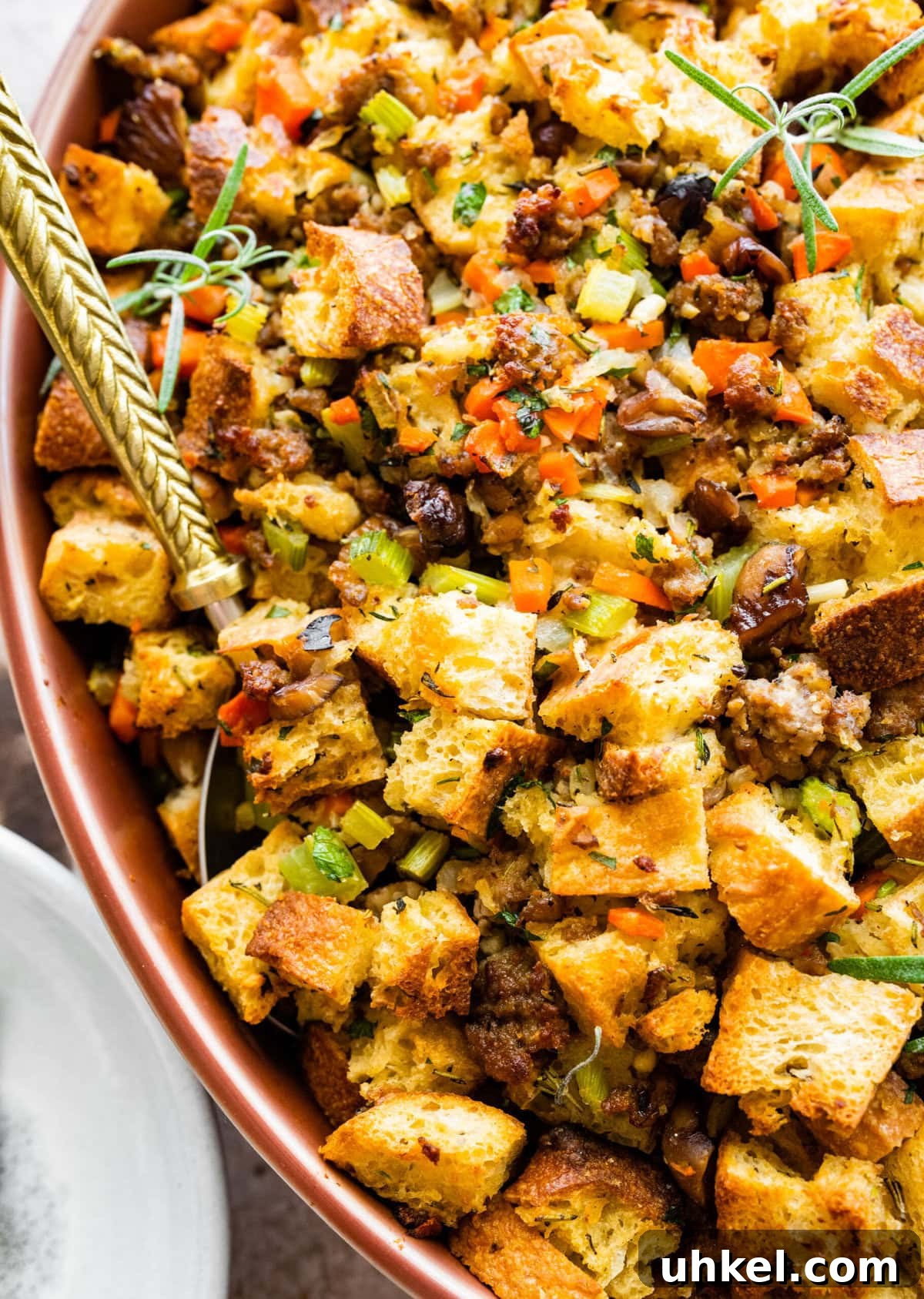 Sausage and Chestnut Ciabatta Stuffing Recipe for Holiday Tables 14 Finished ciabatta bread stuffing with herbs on top.