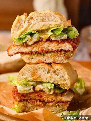 Spicy chicken Caesar sandwich on a plate.