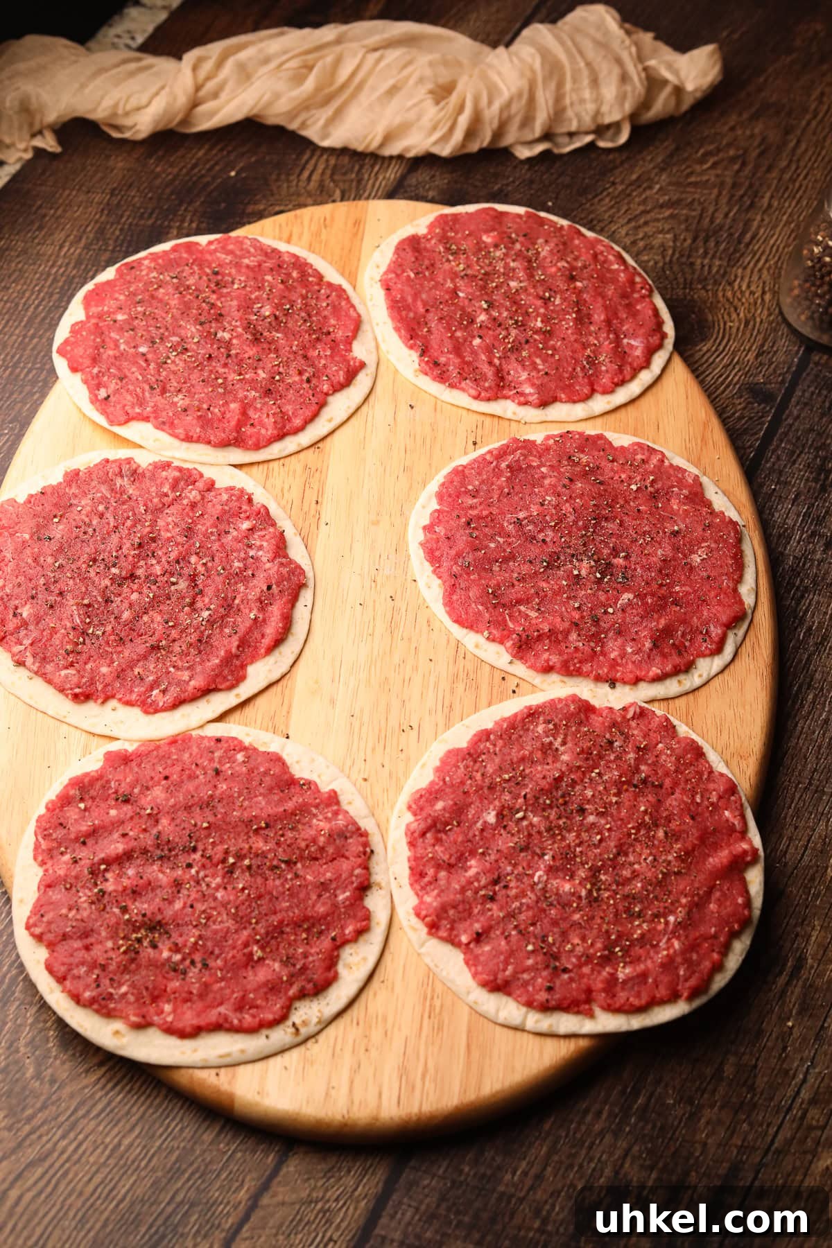 Smash Burger Tacos Recipe: Crispy Smashed Beef Tacos with Cheese 5 Smashburger tacos before being cooked.