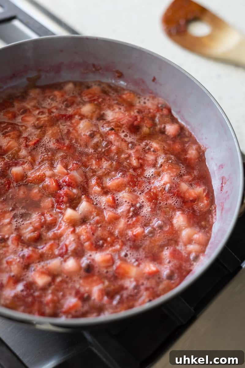 Strawberry Rhubarb Compote Panna Cotta (Dairy-Free) 7 Berry mixture simmering on the stovetop.
