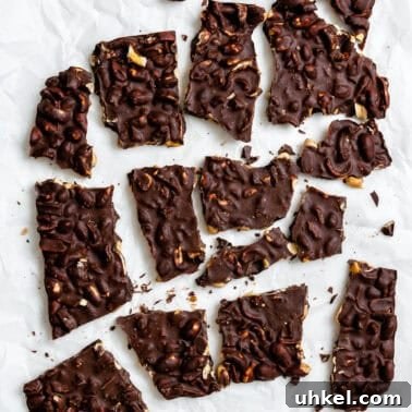 Vegan No-Bake Chocolate Peanut Butter Krispie Balls 10 completed Peanut Butter Chocolate Bark on a white surface