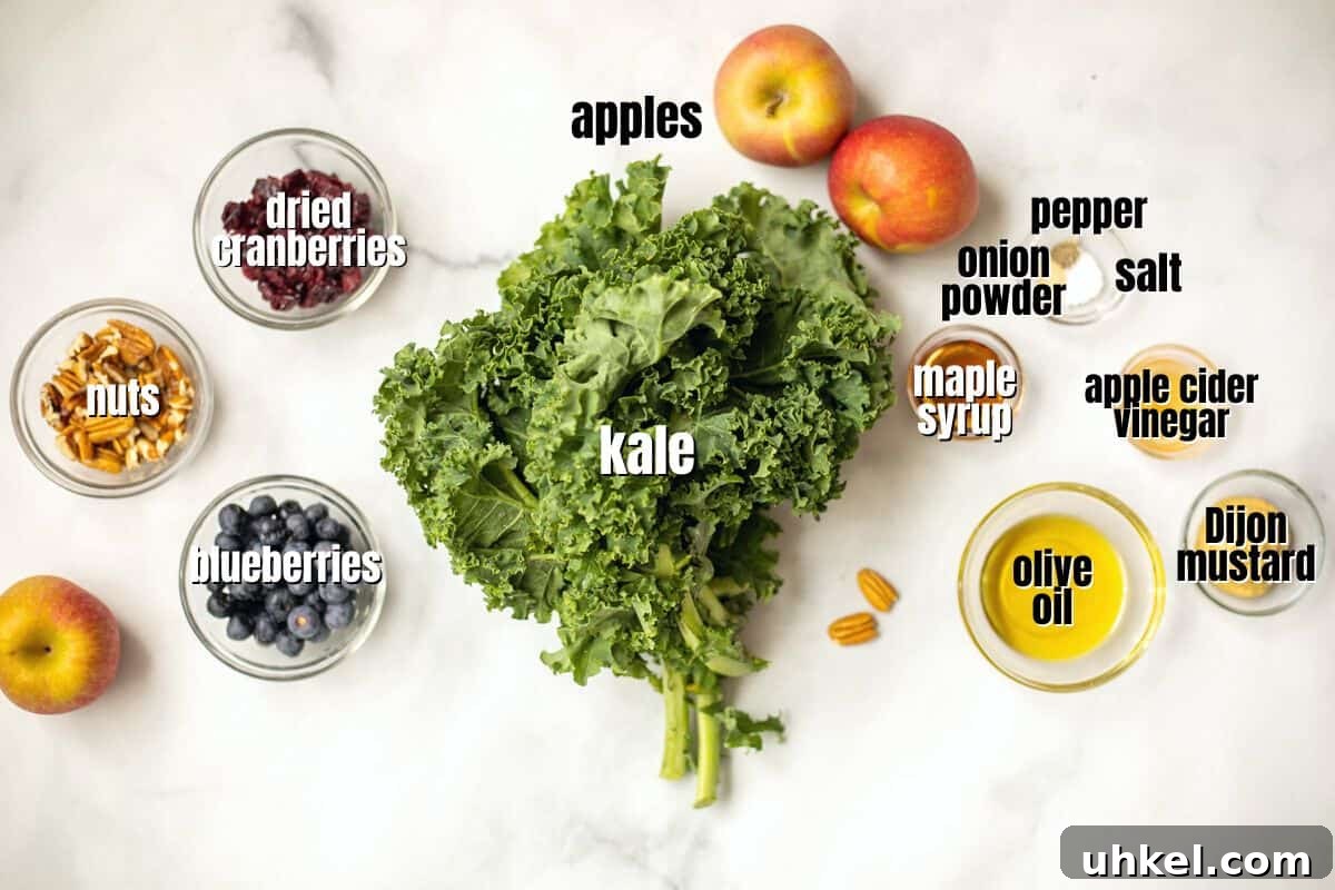 Kale Salad Recipe with Apples Ingredients for kale salad labeled on counter.
