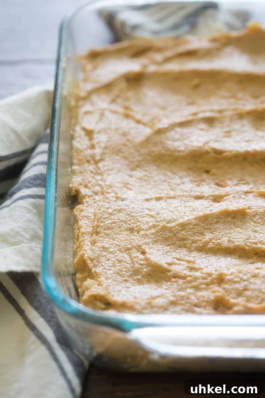 Moist Pumpkin Coffee Cake Recipe for Fall Gatherings 4 Pumpkin Coffee Cake Batter in Glass Dish