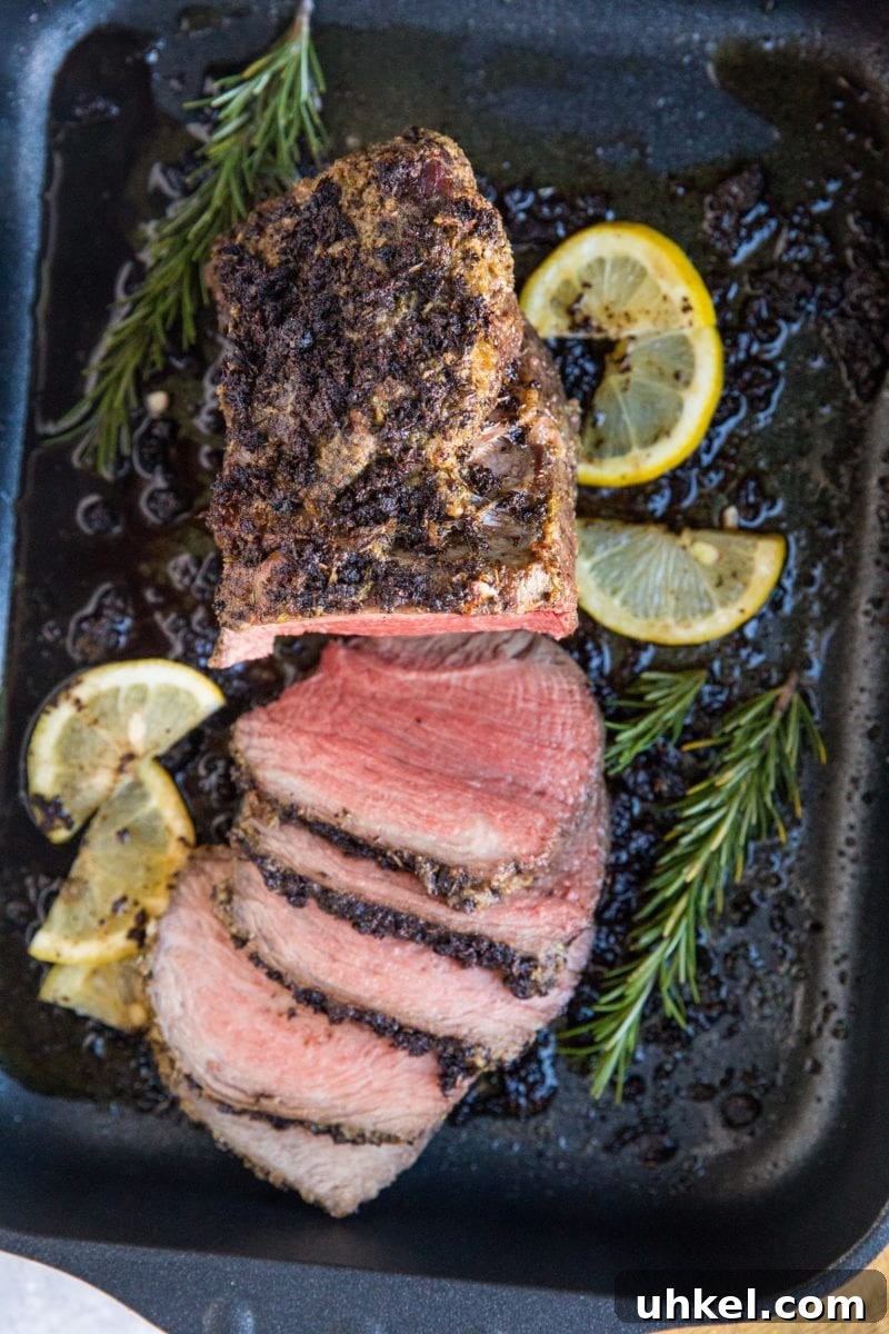 Garlic and Herb Beef Roast Recipe for Juicy Oven-Roasted Beef 3 Garlic Herb Roast Beef - oven roasted beef roast with garlic herb compound butter.