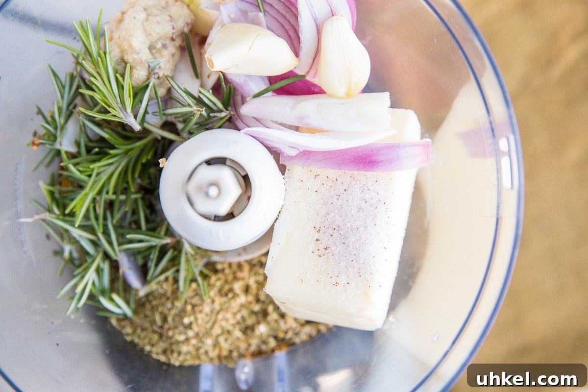 Garlic and Herb Beef Roast Recipe for Juicy Oven-Roasted Beef 5 Ingredients for compound butter in a food processor