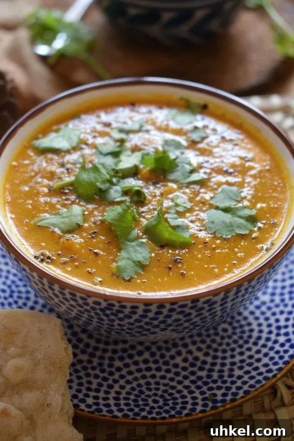 Carrot and Coriander Soup Recipe for Vibrant Flavor and Comfort 2 Close up of carrot and coriander soup in a bowl.