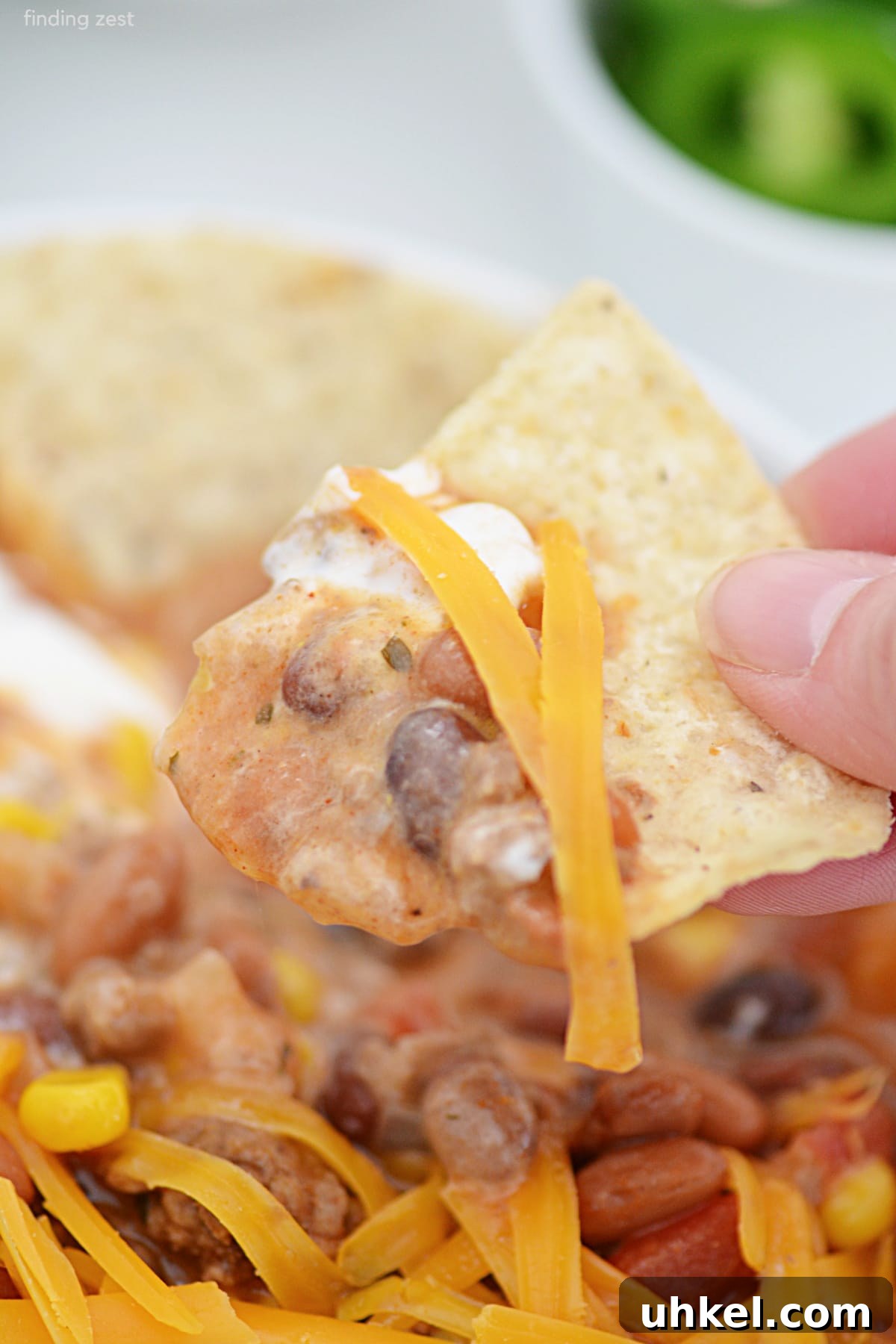 Hearty 7-Can Taco Soup Recipe for Quick Weeknight Dinners 8 A hearty taco soup with tortilla chips, sour cream and shredded cheese.