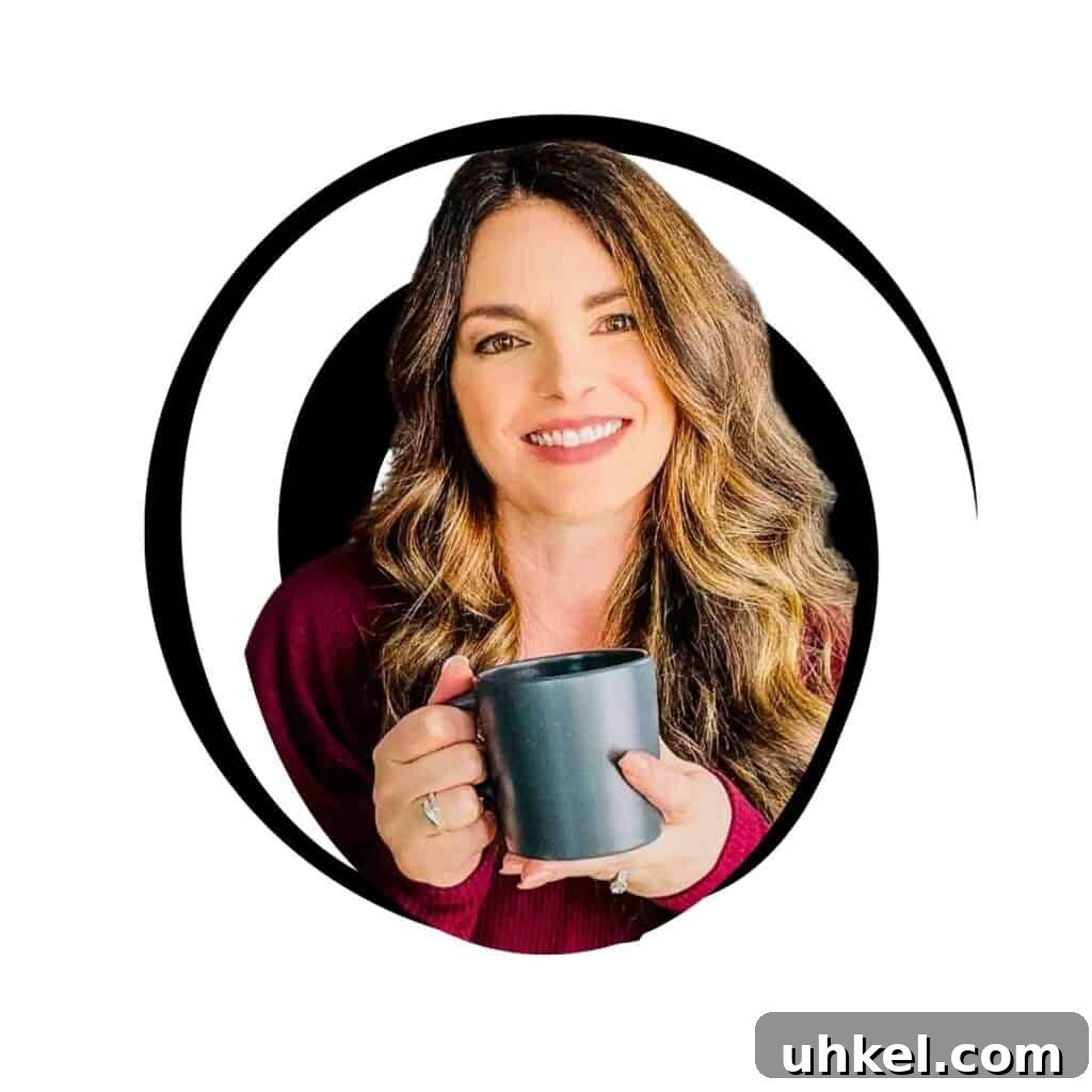 Crispy Cheesy Scalloped Potatoes Made in the Air Fryer 7 A photo of Jeri Walker smiling while holding a cup of coffee, welcoming her readers to her website.