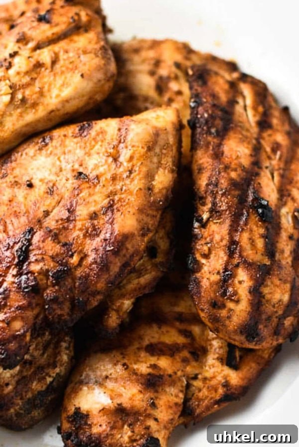 Juicy Mexican-Style Grilled Chicken with Zesty Marinade 12 Mexican grilled chicken on a plate.