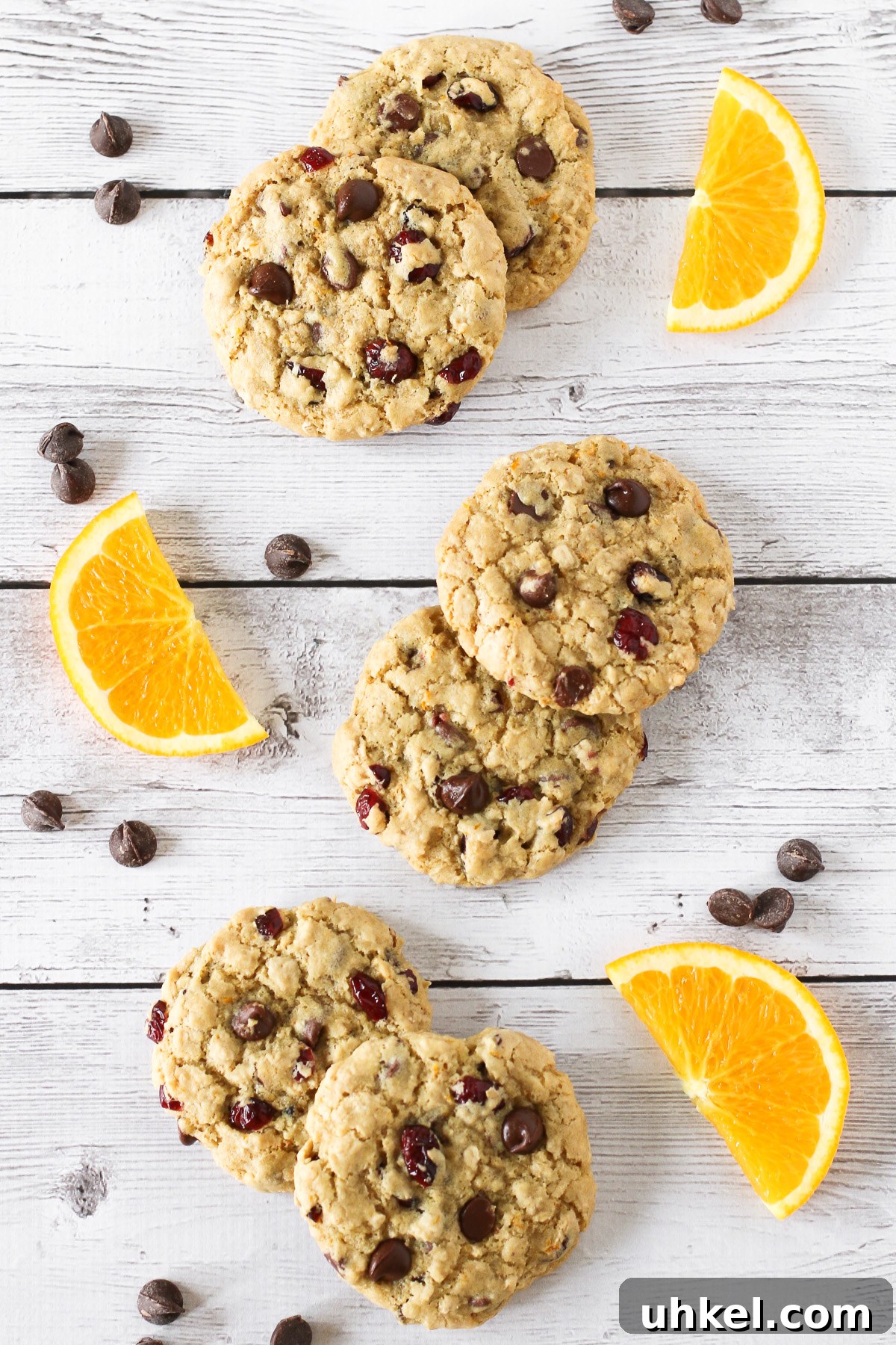 Gluten Free Vegan Cranberry Orange Chocolate Chip Cookies. Chewy cookies with orange zest, dried cranberries and lots of dark chocolate chips!