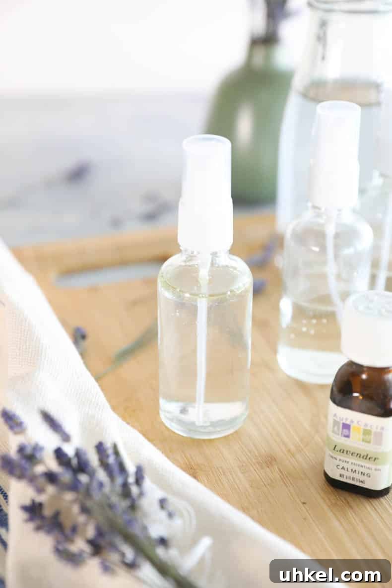 Make Lavender Spray at Home: Simple DIY Room and Linen Mist 6 Lavender spray in a clear glass spray bottle.