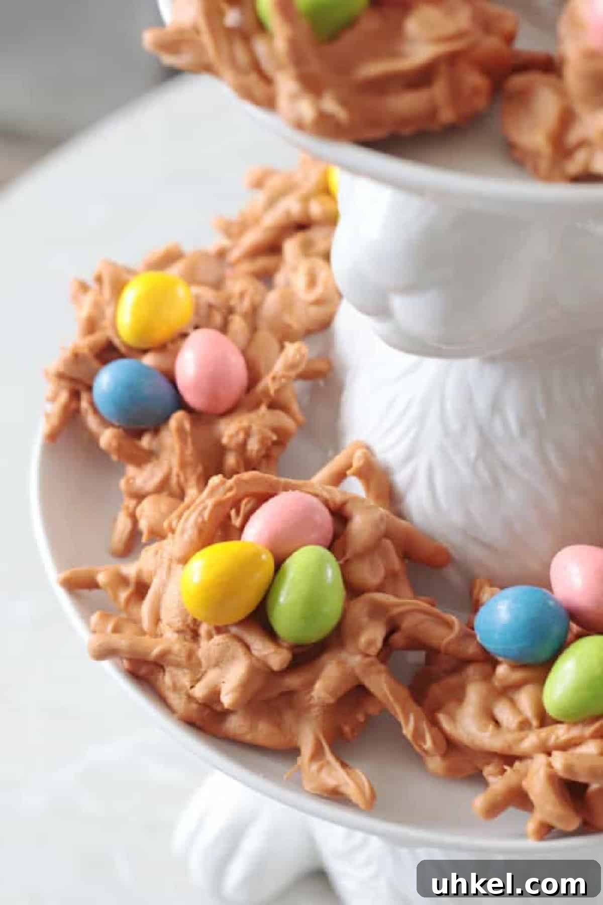 Butterscotch Haystack Cookies | Bird’s Nest Cookie Recipe 2 Bird's nest haystack cookies on bunny platter.