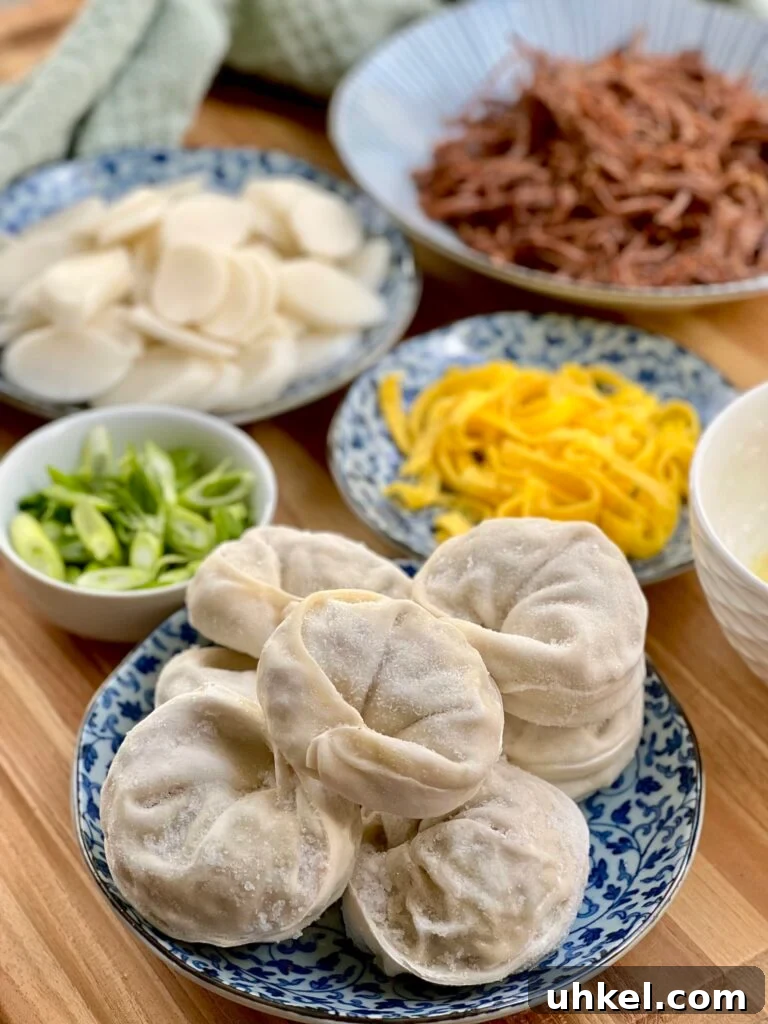 Tteok Mandu Guk Recipe: Korean Rice Cake and Dumpling Soup 5 img 6010 4