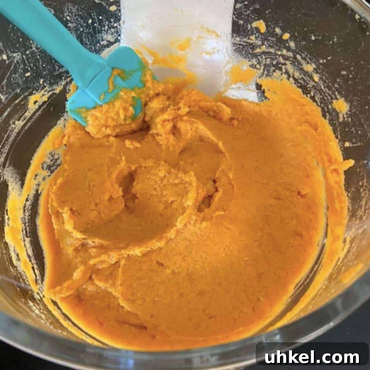 Creamy Whipped Sweet Potatoes Recipe for Holiday Sides 7 Whipped potatoes in glass stand mixer bowl.