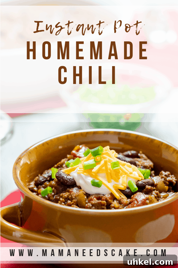 Instant Pot Homemade Chili bowl sour cream scallions cheddar cheese traditional