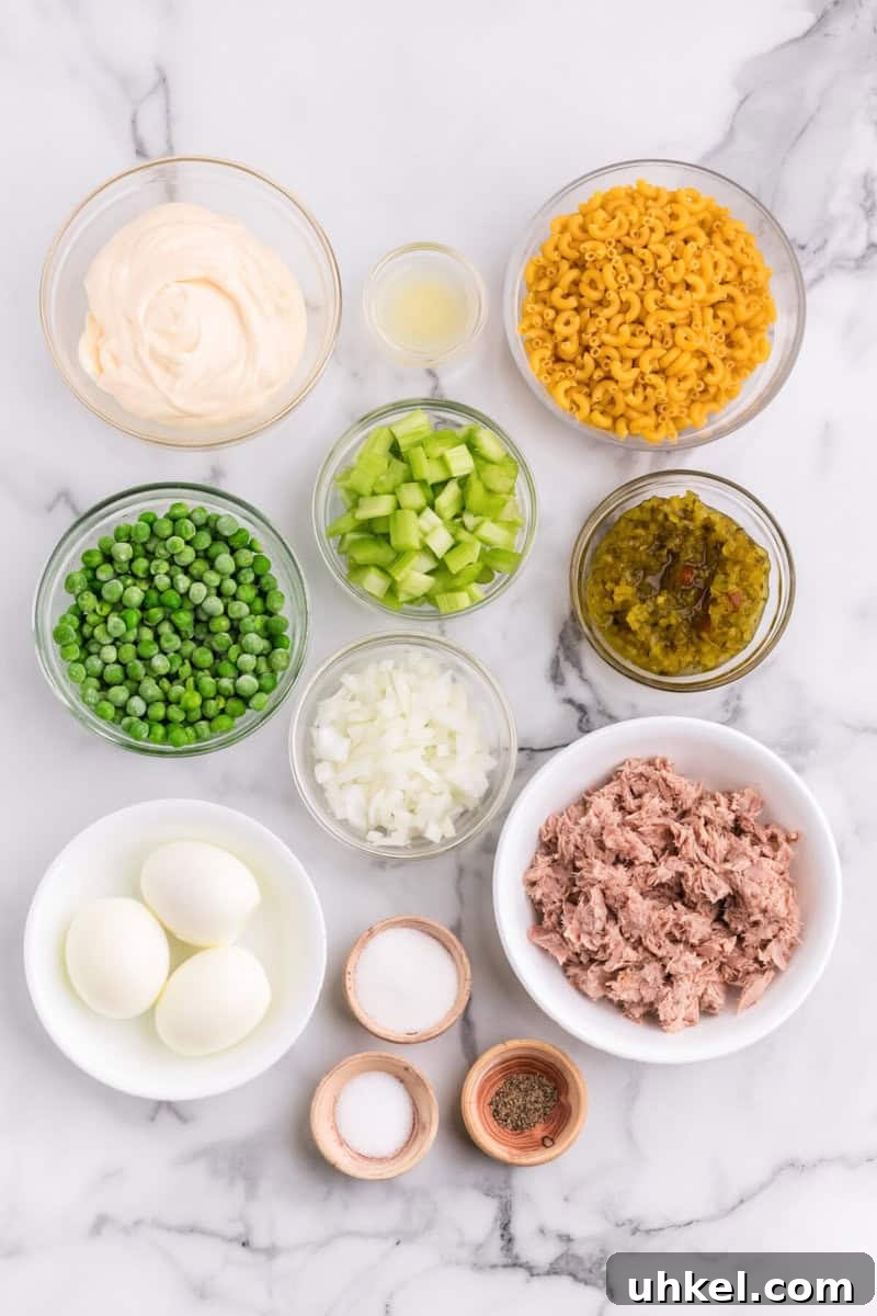 Creamy Tuna Macaroni Salad Recipe for Picnics & Potlucks 3 ingredients for the Tuna Macaroni Salad.