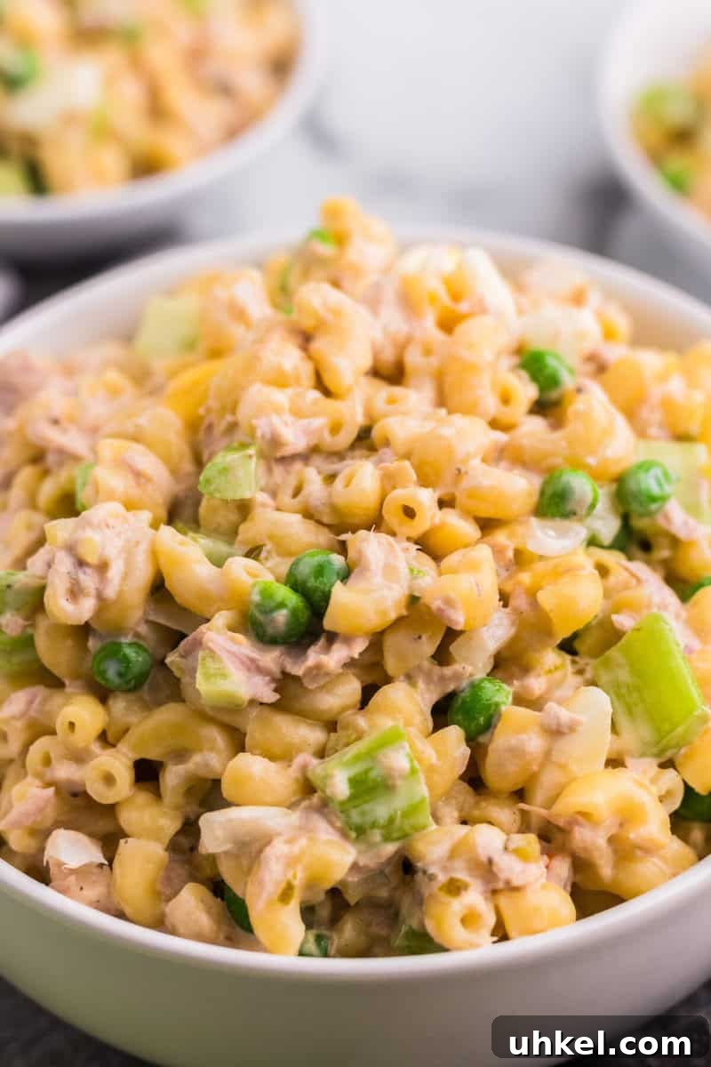 Creamy Tuna Macaroni Salad Recipe for Picnics & Potlucks 10 closeup of the Tuna Macaroni Salad in white serving bowl.
