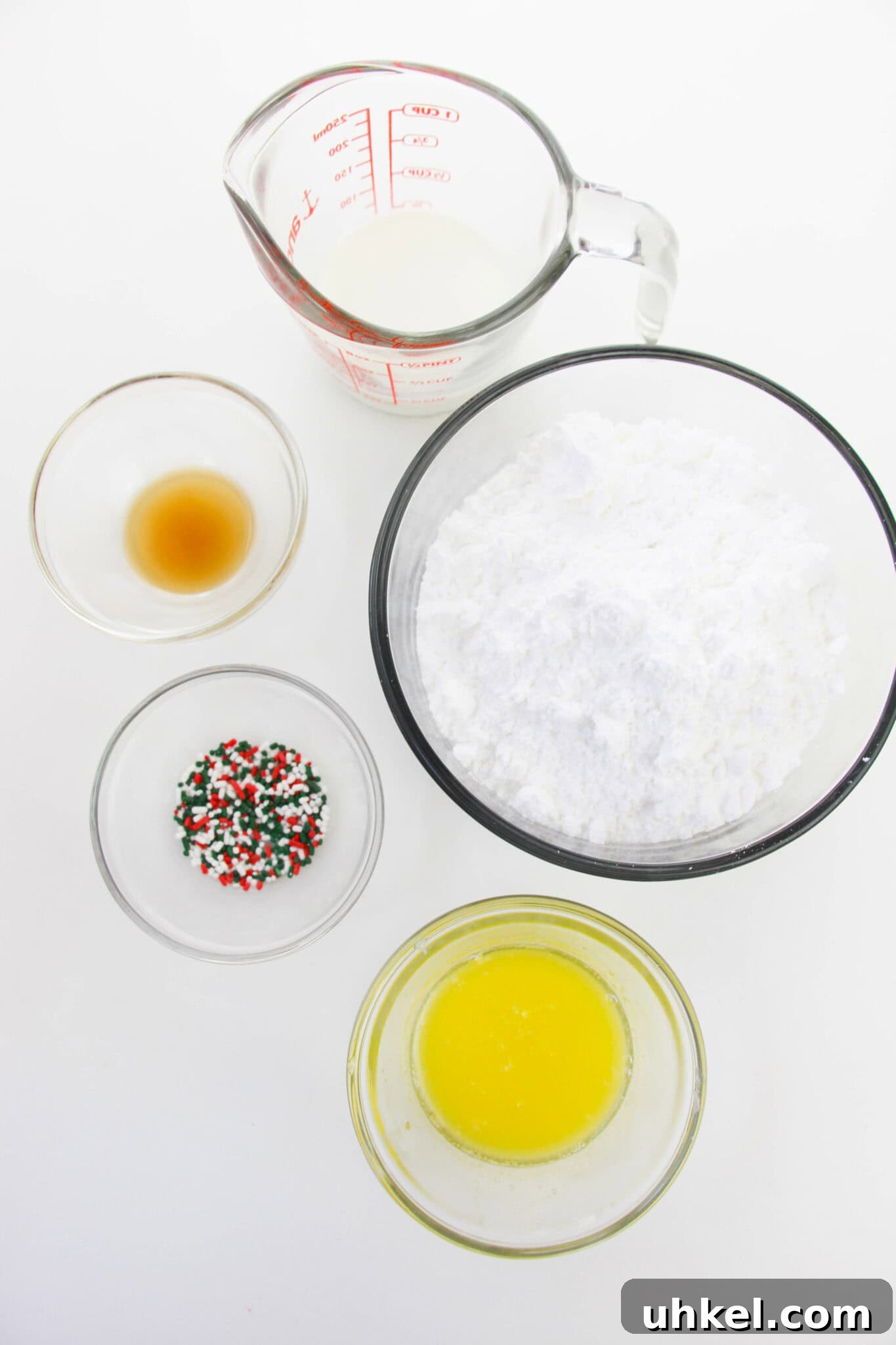 Flour, extract, sugar and eggs for the cookies.