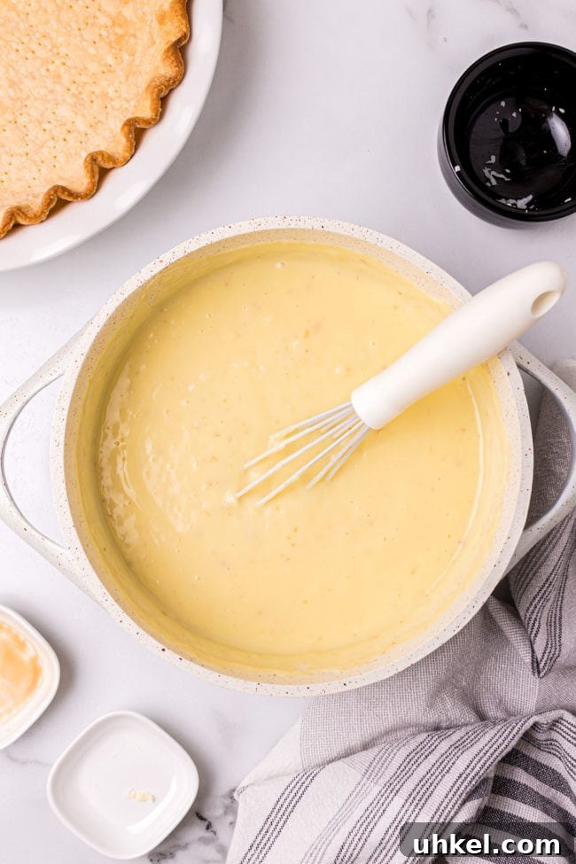 coconut custard pie filling in a pot on a counter