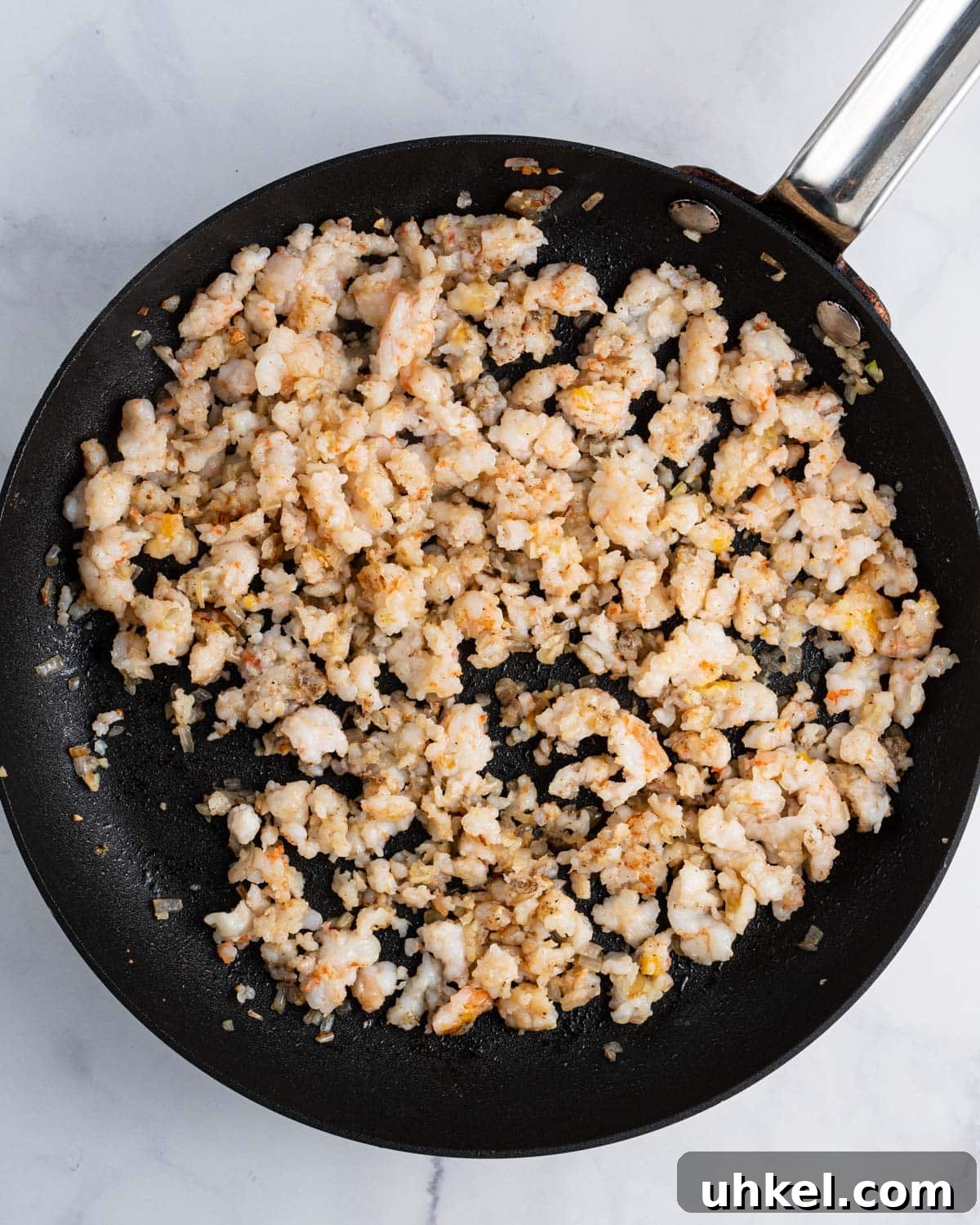 Cooked shrimp on a pan.