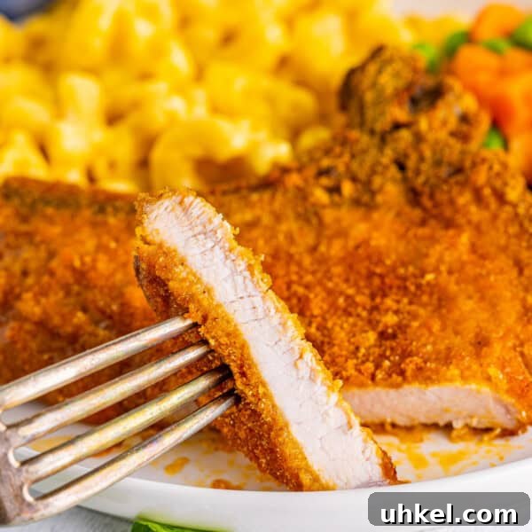 Smoked Pork Chops Recipe: Tender, Juicy Flavor from the Smoker 10 piece of shake and bake pork chops on a fork