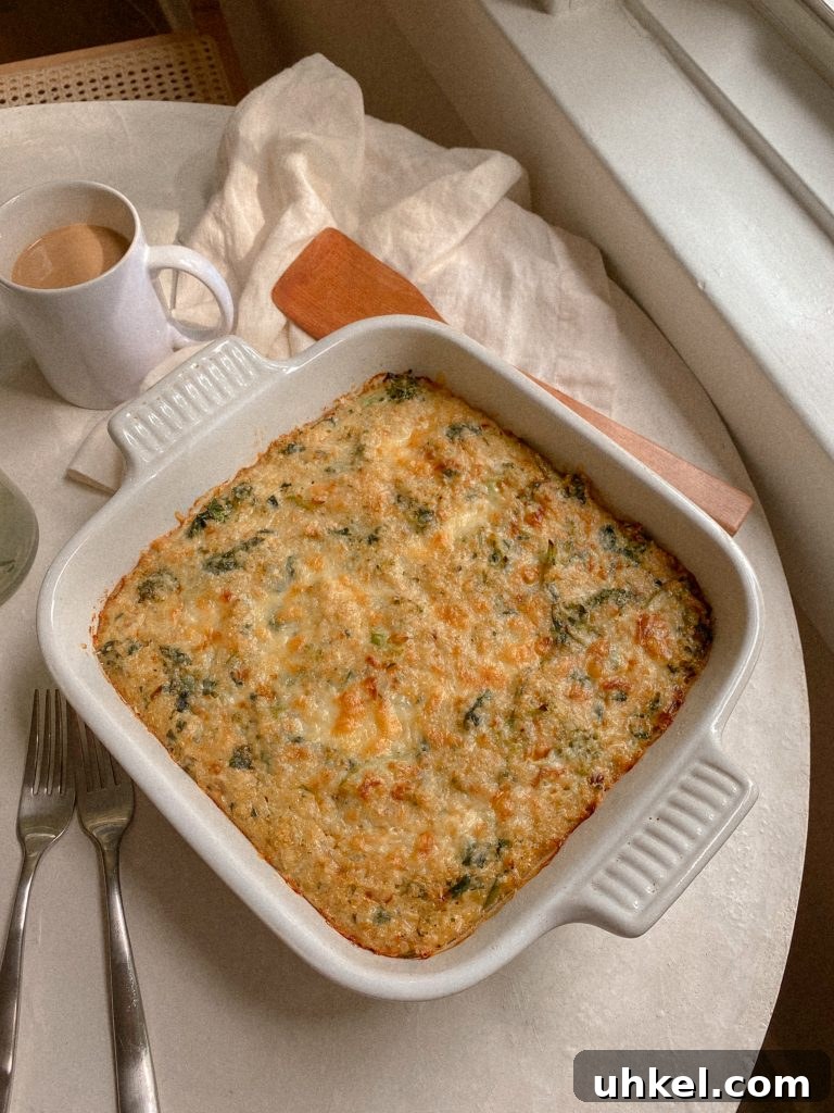 Gluten-Free Easter Brunch Menu Ideas and Recipes 3 broccoli cheddar quinoa breakfast bake in a white baking dish with a wooden spoon and mug of coffee