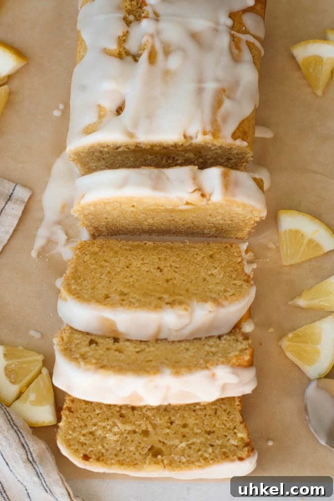 Gluten-Free Easter Brunch Menu Ideas and Recipes 8 lemon loaf with glaze sliced on brown parchment paper