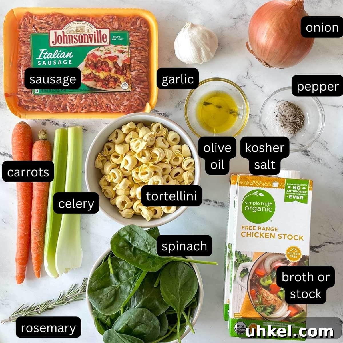 Instant Pot Tortellini Soup Recipe: Creamy Italian Comfort in 20 Minutes 3 The ingredients for Instant Pot Tortellini Soup are shown on a white marble counter.