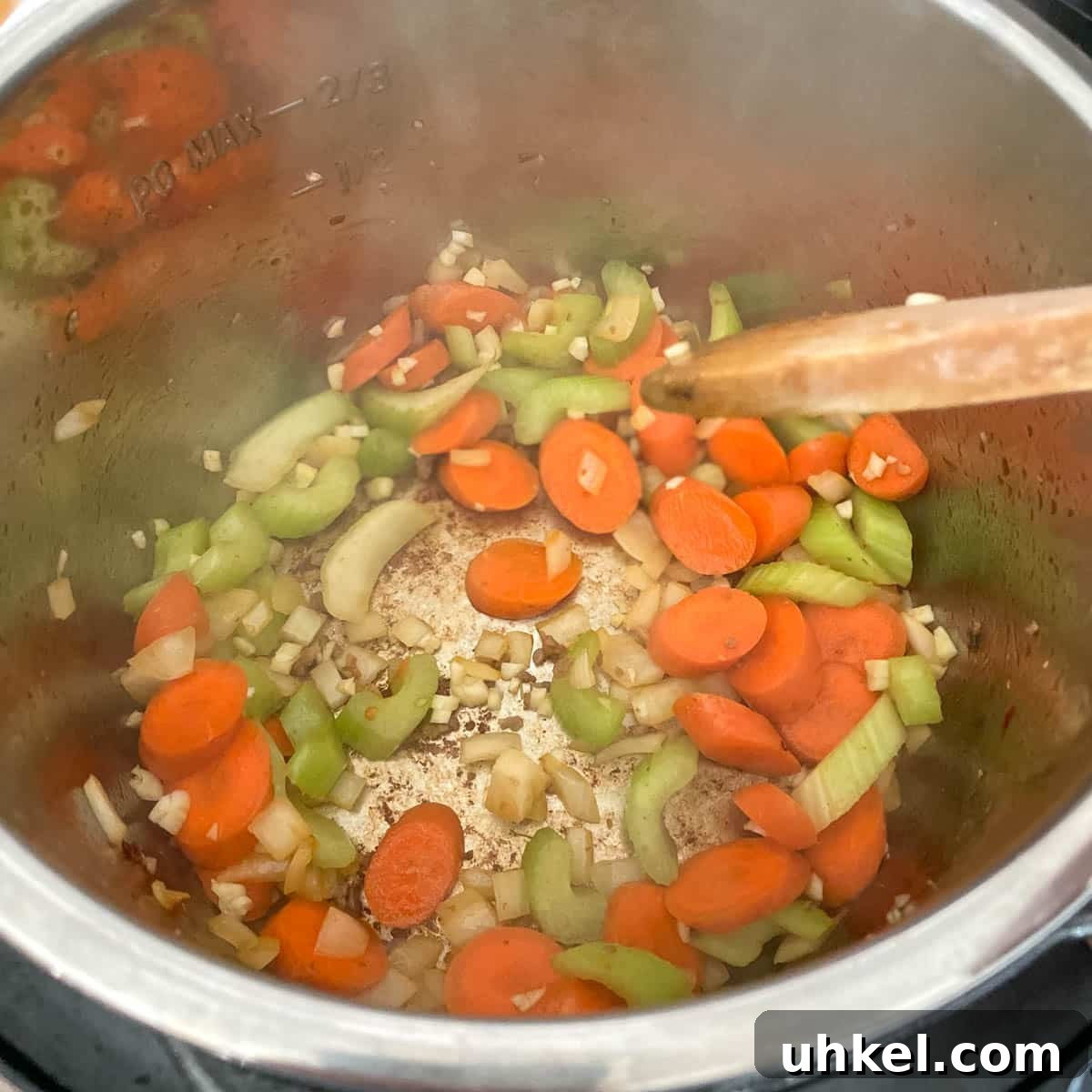 Instant Pot Tortellini Soup Recipe: Creamy Italian Comfort in 20 Minutes 7 Garlic is added to the pot.