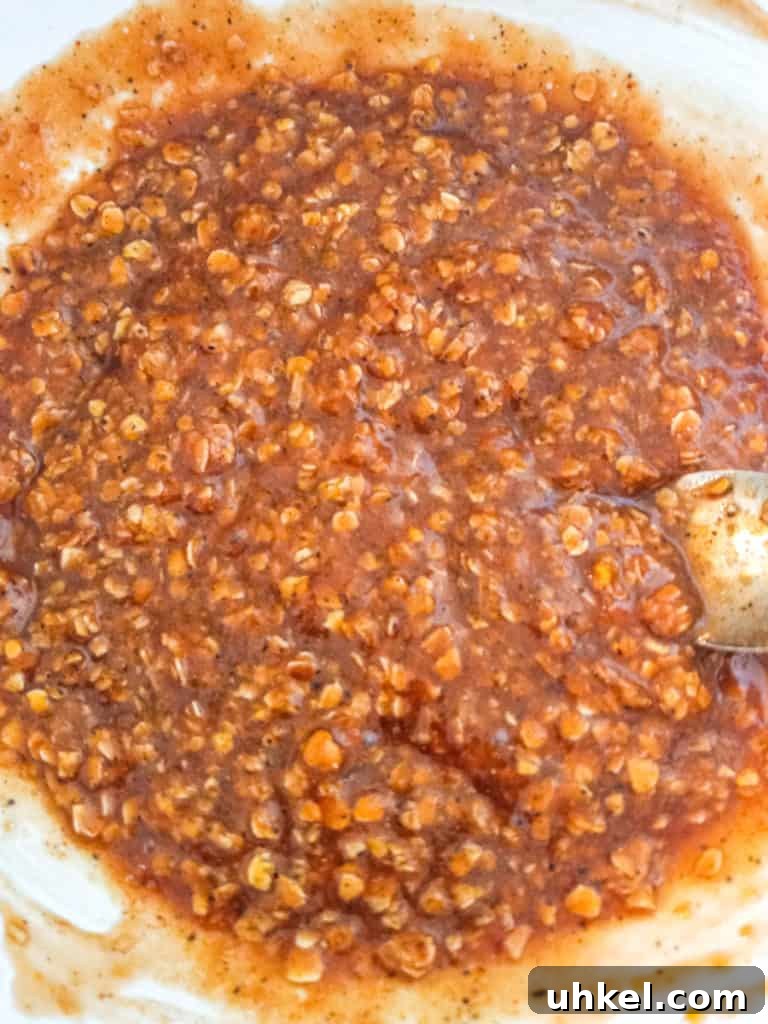 Amish-Style Grilled Burgers Recipe for Juicy Backyard BBQ 3 oats-egg-sauce-and-seasonings-for-hamburgers