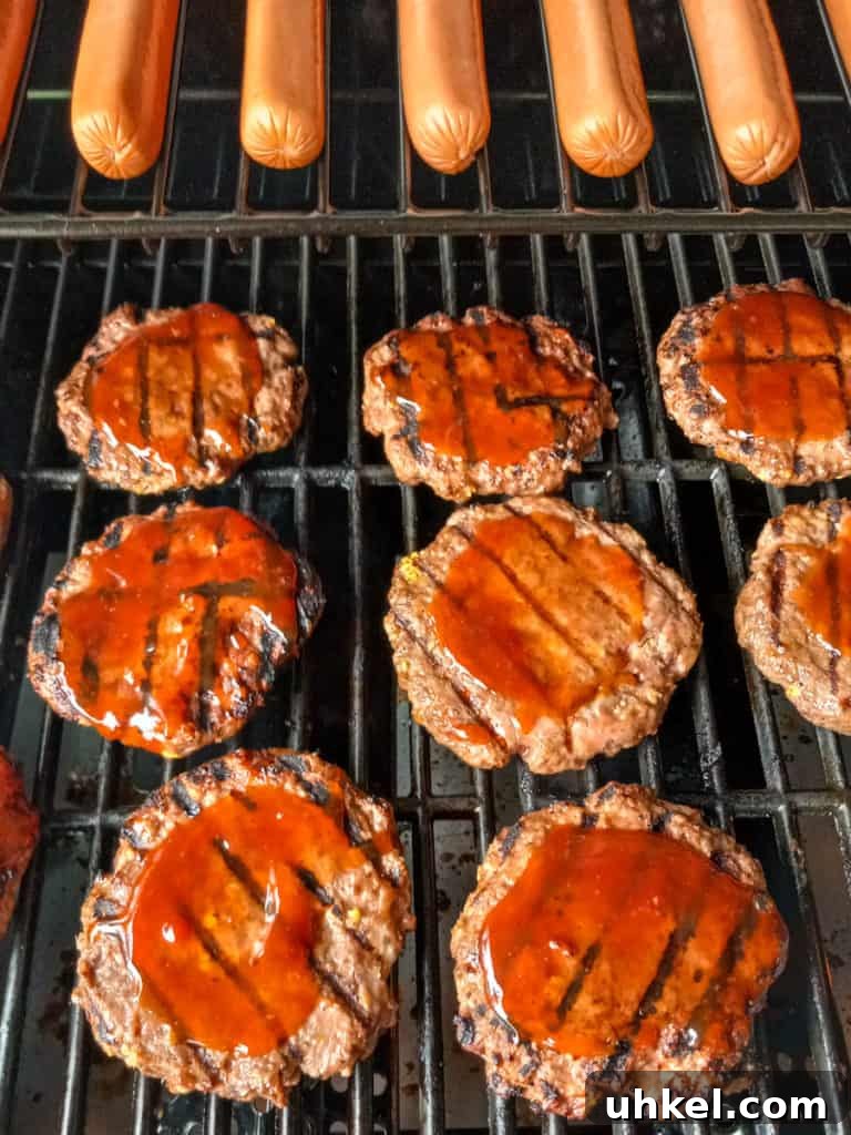Amish-Style Grilled Burgers Recipe for Juicy Backyard BBQ 7 barbecued burgers and hot dogs on the grill