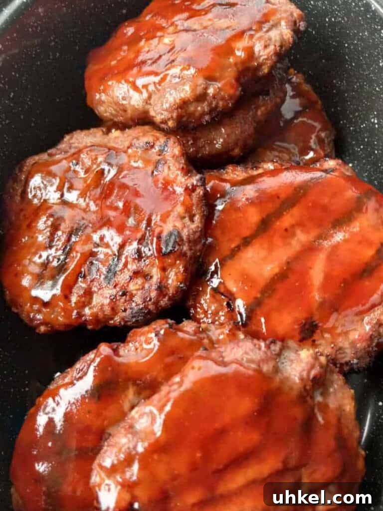 Amish-Style Grilled Burgers Recipe for Juicy Backyard BBQ 9 pan full of bbq burgers