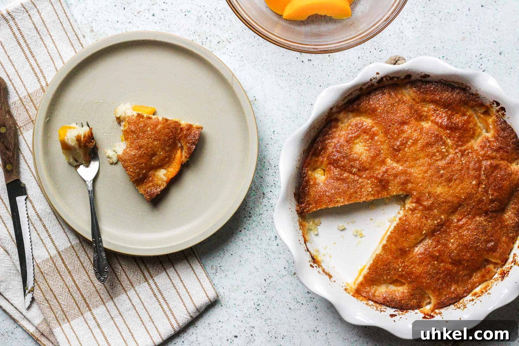 Classic Southern Peach Cobbler Recipe — Homemade & Fruity 12 slice of peach cobbler with ice cream