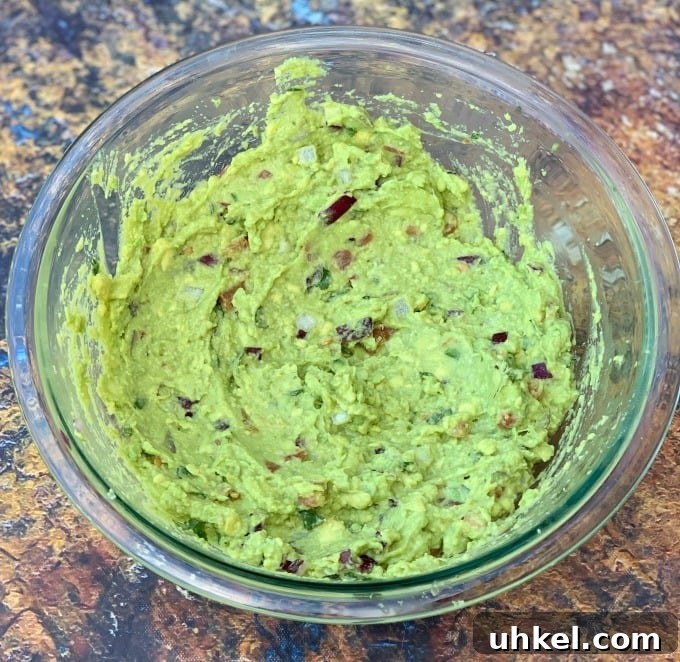 Quick Homemade Guacamole Recipe Ready in Minutes 5 keto low carb guacamole in a glass bowl