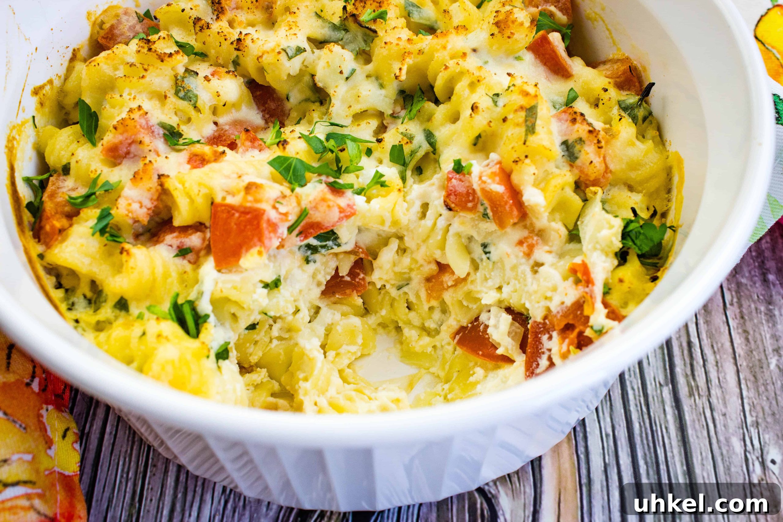 19 Budget-Friendly Dinners That Cut Your Grocery Bill (Delicious!) 15 Ricotta and Tomato Pasta in a white bowl.
