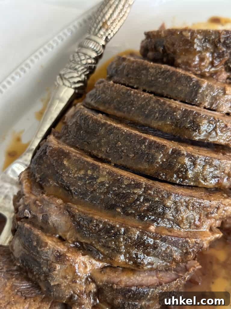 Spice-Rubbed Pot Roast That Melts in Your Mouth 3 close up of sliced spice-rubbed pot roast