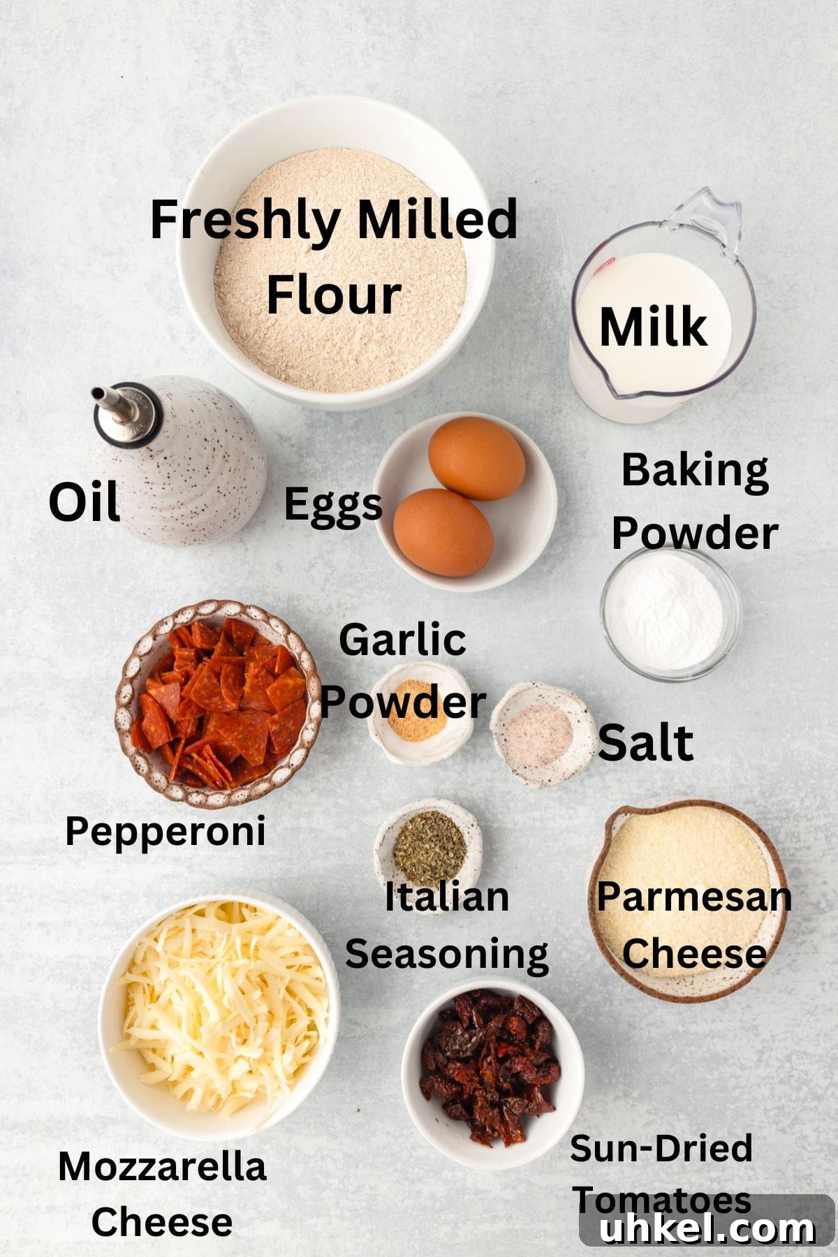 Cheesy Pizza Muffins Recipe: Savory Bite-Sized Breakfasts 4 Ground flour, fresh milled flour, food ingredients for baking.