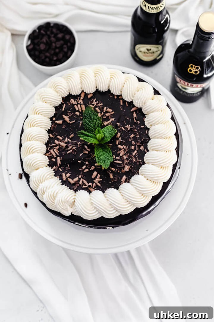 Baileys Brownie Cheesecake Recipe: Decadent Chocolate Whiskey Cheesecake 9 overhead shot of cheesecake on a cake stand