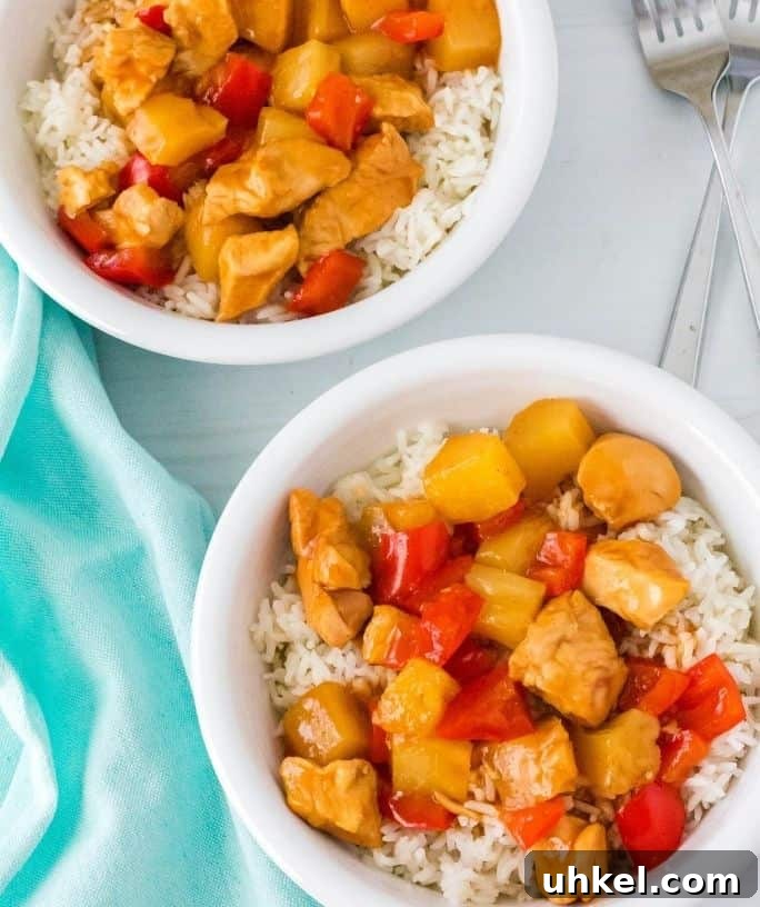 two bowls of Instant Pot Hawaiian chicken and rice ready to be served