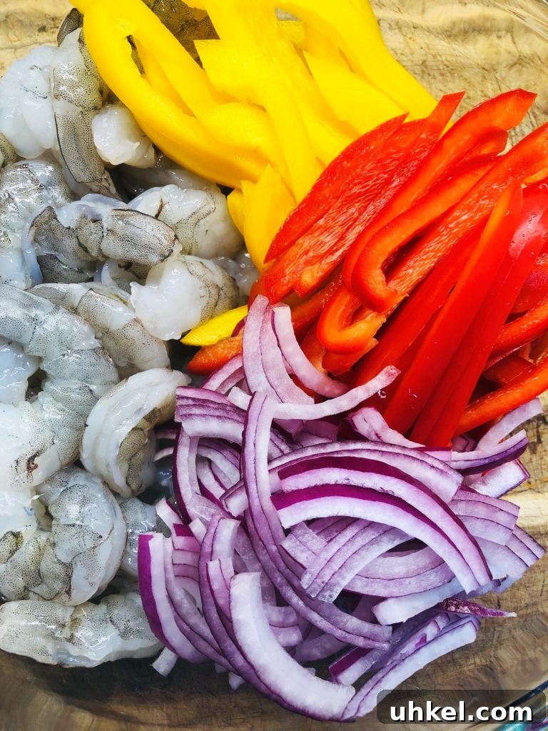 Crispy Air Fryer Shrimp Fajitas with Peppers and Onions 2 shrimp peppers and onions before cooking