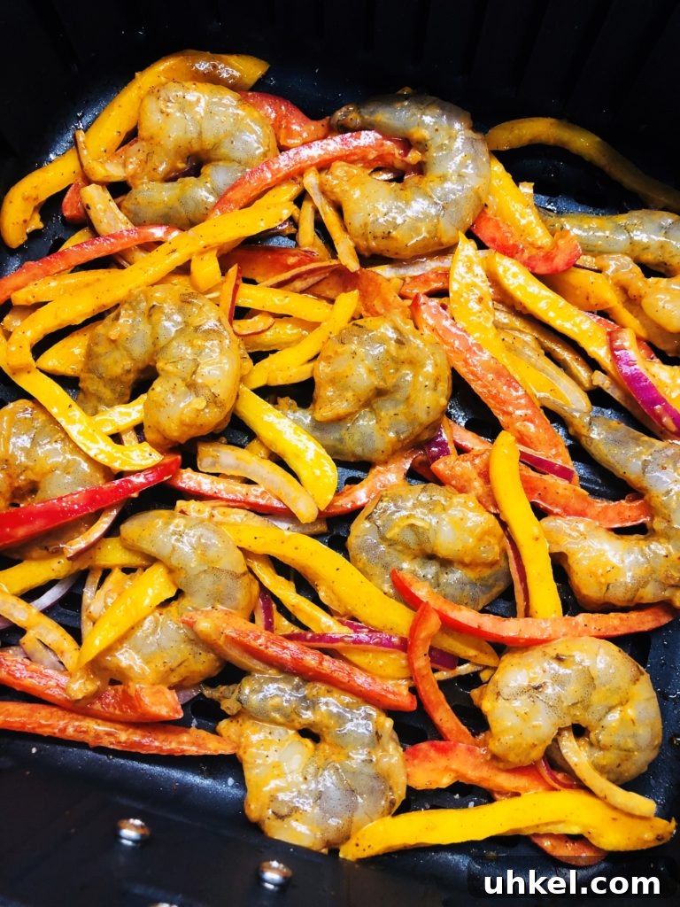 Crispy Air Fryer Shrimp Fajitas with Peppers and Onions 6 fajitas on the air fryer before cooking
